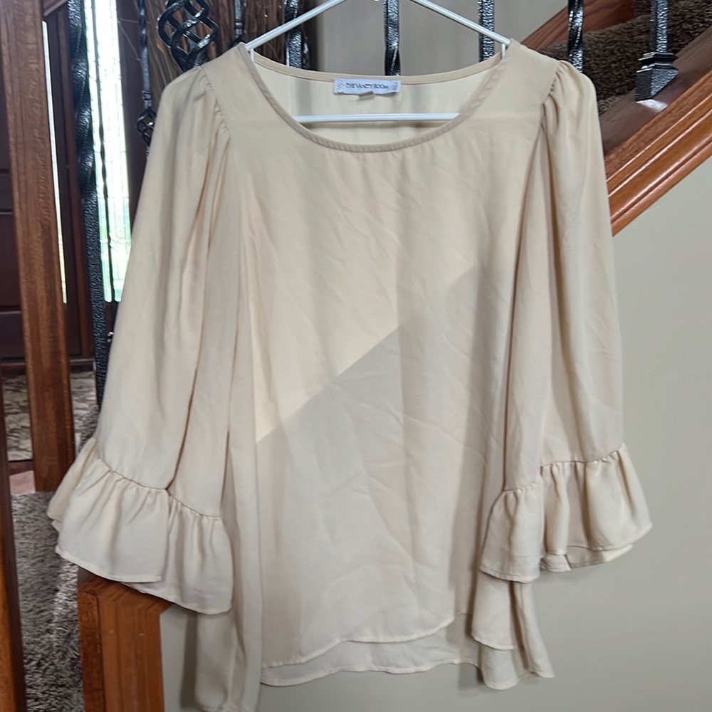 Size small cream blouse with bell sleeves from the vanity room